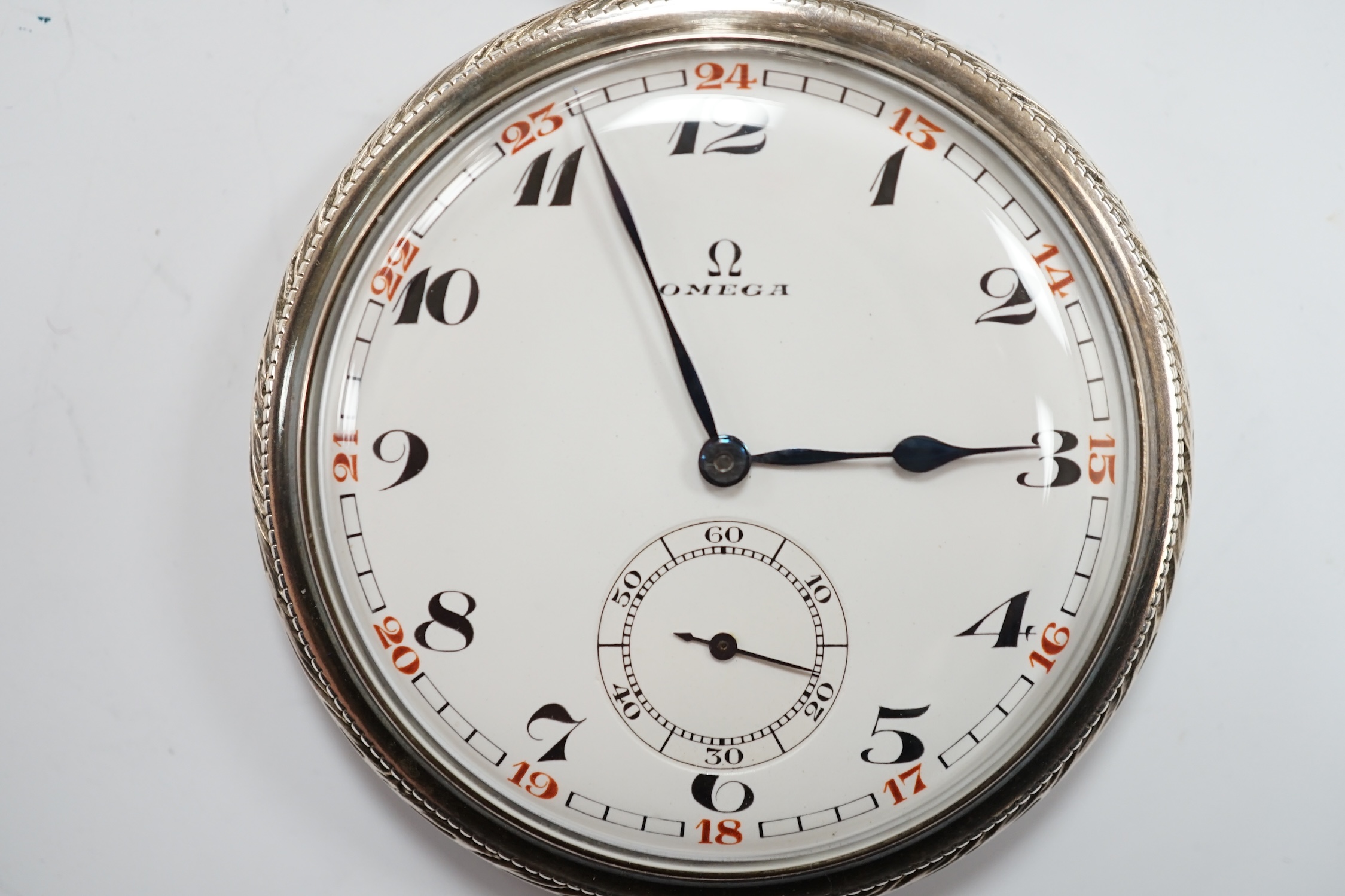 A German 900 standard cased Omega keyless open face dress pocket watch, with Arabic dial and subsidiary seconds, case diameter 48mm, together with an unmarked white metal albert.